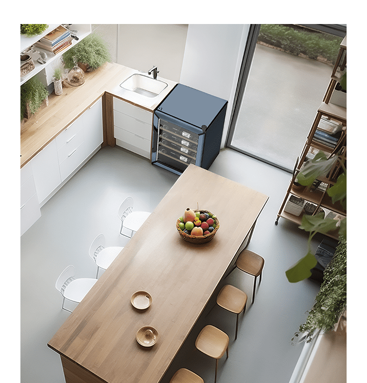 Une cuisine / salle à manger en bois vue du dessus.